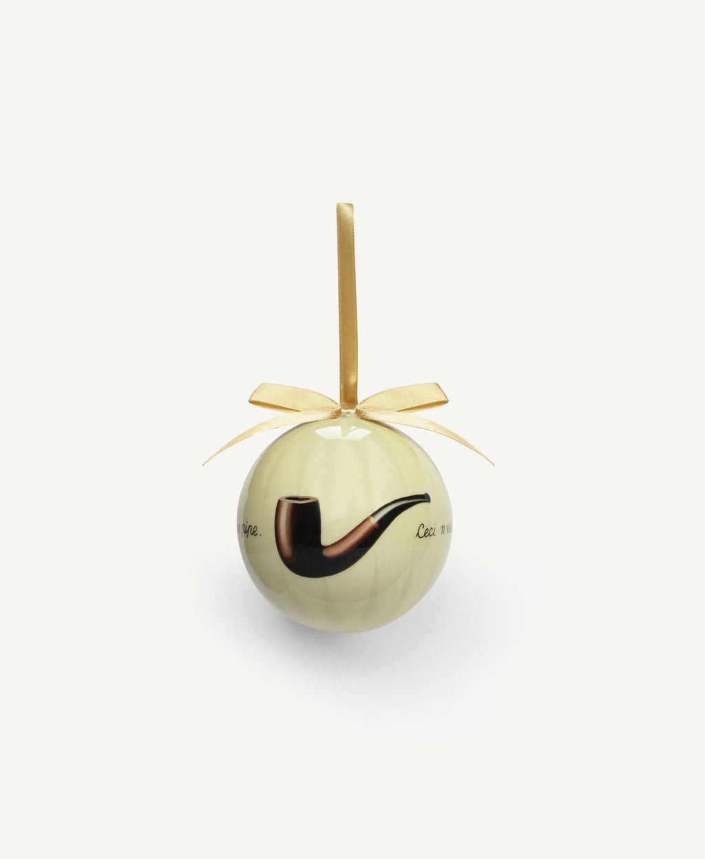 Boule de Noël « La Trahison des images »