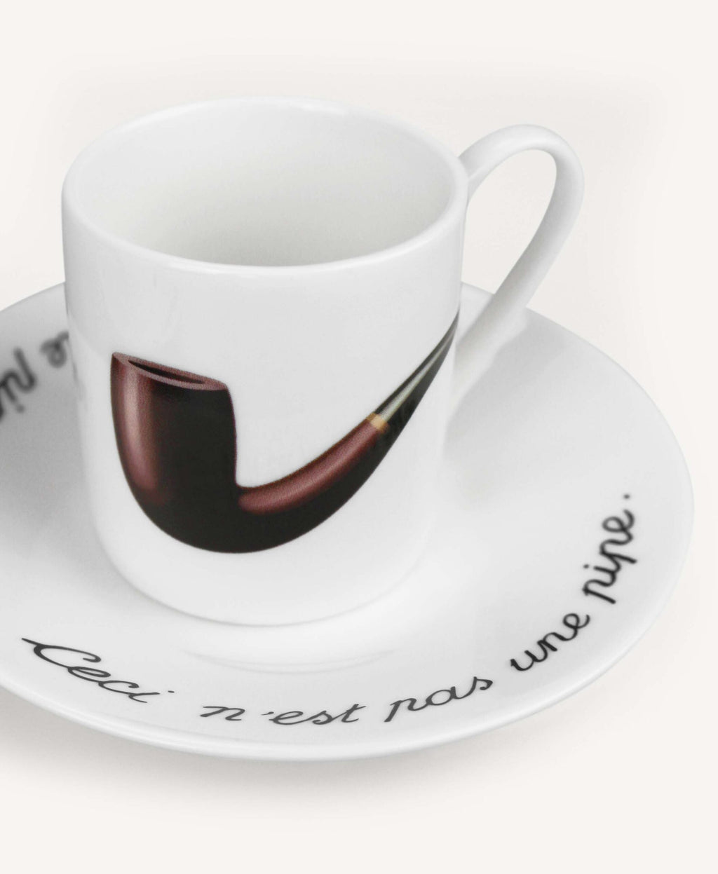 Set à espresso « La Trahison des images »/ « Ceci n’est pas une pomme »